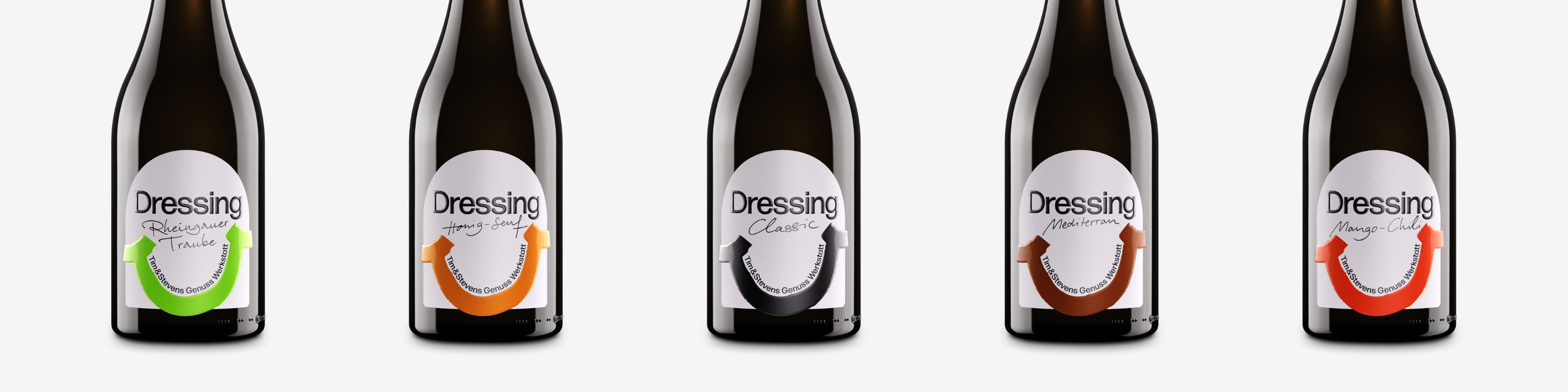 Sortiment aus Tim & Stevens Dressings in Glasflaschen für Händler